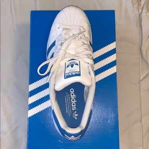 Adidas tennis shoes. Barely worn!!